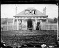 "Elizabeth Ville" cottage, woman and child A2823032h.jpg